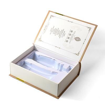 China Creative Recycled Materials Custom Skin Care Box Packaging Magnetic Cosmetic Book Shaped Box Cardboard Rigid Book Gift Box for sale