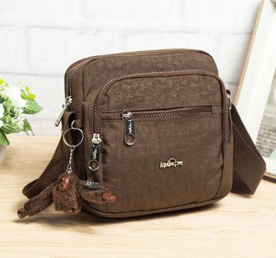 China 2022 New Fashion Water Proof Square Polyester Women Casual Bag Multi Layer Shoulder Case With Orangutan Decoration for sale