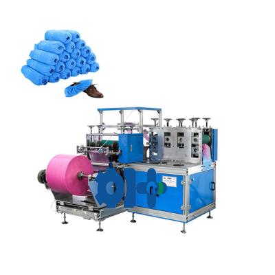 China Hotels Line Rubber Band Shoe Cover Making Machine for sale