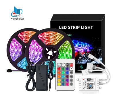 China New smart decoration phone Alexa Wifi Control 32.8ft 10m 12v smd 5050 RGB color led strip set with adapter and 24 key Wifi controllers for sale