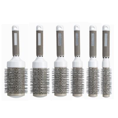 China Home Gray Aluminum Tube Hair Comb Ceramic Round Fluffy Heat Conduction Air Roll Styling Hair Comb Tool for sale