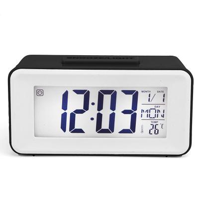 China Voice-activated Luminous Electronic Mini Bedside Calendars Silent Nap Alarm Clock for sale