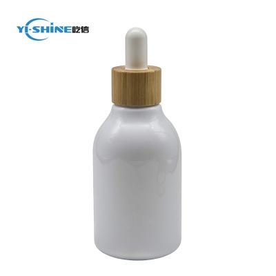 China For 120ml PET Cosmetic White Plastic Bottle With Wooden Dropper Cap for sale