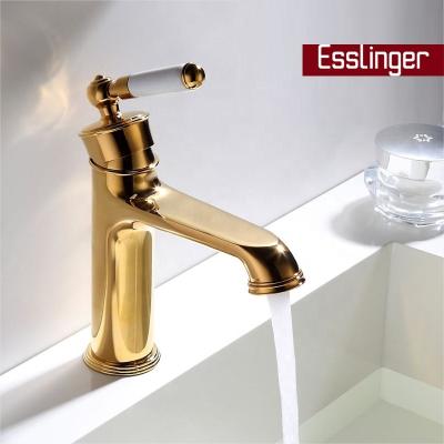 China Hot Selling Sanitary Ware Metered Hot Faucets And Cold Handle Zinc Handle Body Basin Faucet Mixer Tap Gold Color Brass Surface for sale