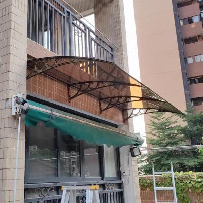 China Protect Your Door and Entry Area with Aluminum bracket Bronze Polycarbonate PC solid sheet Canopy Strong Impact-Resistant and UV-Resistant for sale