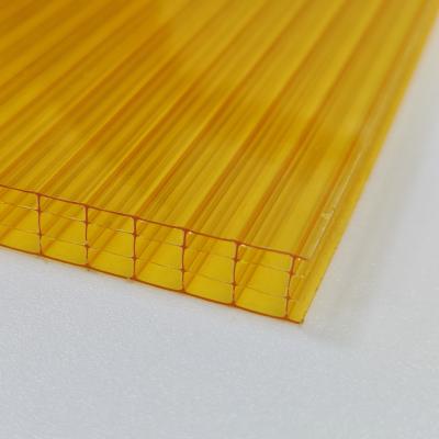 China Factory price Yellow 10mm Four-Layer Polycarbonate Hollow Sheet The Ultimate Combination of Insulation Impact Resistance and UV Protection for sale