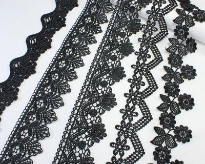 China 2022 Hot Selling Beautiful 100%Polyester Water Soluble Embroidered Black White Bridal Lace Fabric Viable for sale