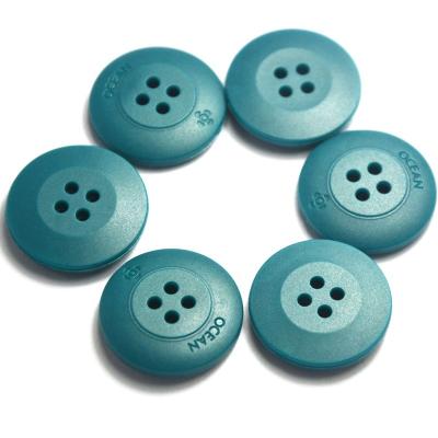 China Viable Hot Selling Injection Rubber Button 4 Holes Plastic Buttons For Shirt for sale