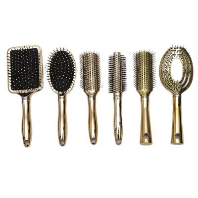 China HEYAMO Gold Bling Waterproof Hair Brush Wig Hair Extension Sweep Detangler Hairbrush Detangle Comb Paddle Hair Brush Makers for sale