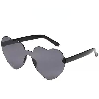 China Fashion Sunglasses Wholesale Custom Rimless Glass Candy Color PC Rimless Sunglasses Trend Love Shape Women's UV400 Sunglasses Fashion Sunglasses for sale