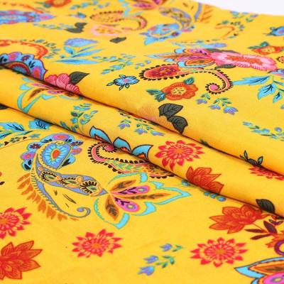 China Wholesale custom print 100% african rayon plain or stock black yellow flower woven fabric for sale