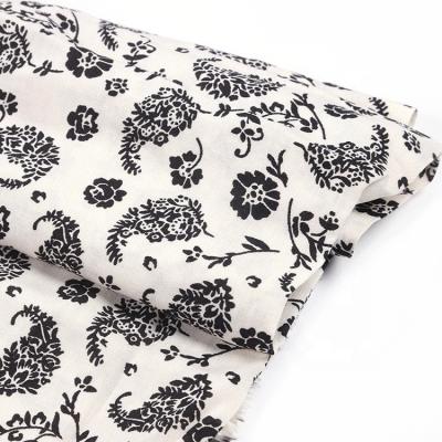 China Plain Custom Pattern Rayon White Ground Black Floral Challis Printing Fabric for sale