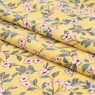 China Memory China Supplier Custom Pattern Yellow Floral Leaves Print Elastic Polyester Crepe Fabric for sale