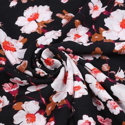 China Wholesale Simple Black Red Stock Bali Floral Print Hawaiian Woven Viscous Rayon Fabric for sale