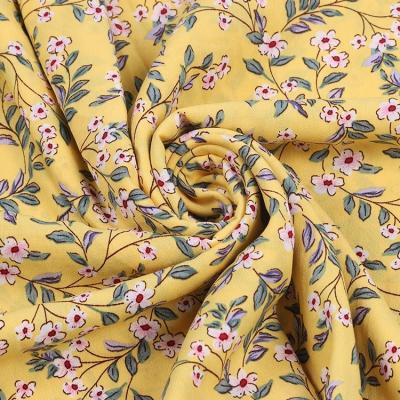 China Memory Woven Weave Poly Wholesale Moss Crepe Fabric For Dress Plain African Yellow Print Elastic Polyester Print for sale