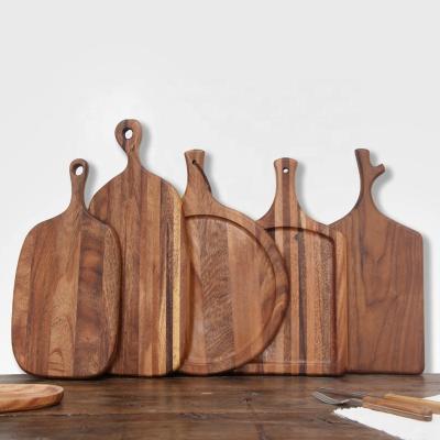 China Viable Custom Wooden Cake Sushi Cutting Board Black Walnut Trays Breadfruit Pizza Tray Pizza Serving Board Kitchen Cutting Board for sale