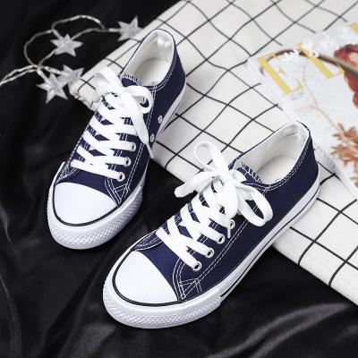 China Fashion Trend Low Top Flat Bottom Canvas Shoes Comfortable Sports High Top Casual Shoes For Unisex for sale