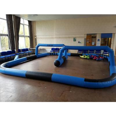 China Festvial holiday caixin race track sports games custom inflatable kart racing field for sale