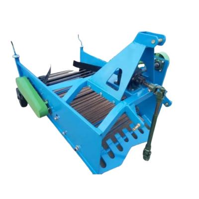 China Fertilizer Spreaders Tractor Mounted Mini Belt Peanut Carrot Potato Garlic Onion Harvester for sale