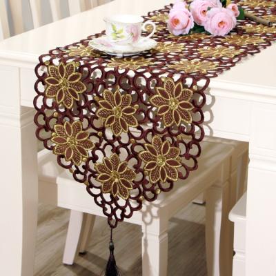 China Hollow manufacturers supply new European classic embroidered polyester tablecloth set, table red flag for sale