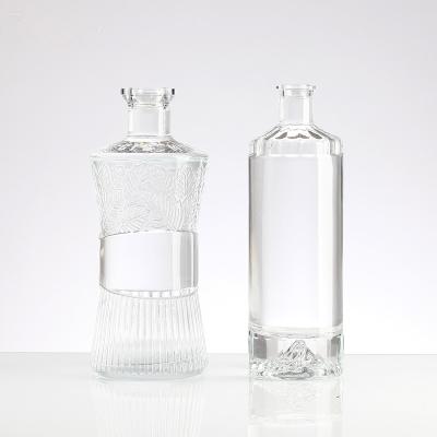 China Beverage glsaa blttle packaging super flint white glass material with thick bottom fire shape liquor glass bottles for sale