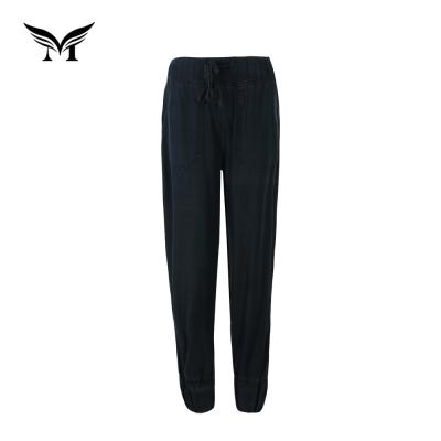 China Sustainable High Quality Stylish Plain Dyed Cotton Women Denim Harem Pants Long for sale