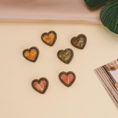 China Retro Vintage Gold Alloy Acrylic Heart Stud Earrings for sale