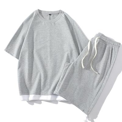 China Lunan Breathable Apparel | 2022 summer new product pure color knitted shorts male T-shirts half sleeve easing off two pieces leisure W for sale