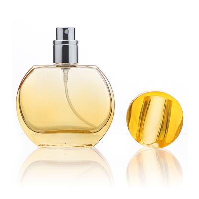 China New Style 30ml Fancy Round Perfume Bottle Gold Round Perfume Bottle for sale