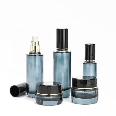 China Latest Design Latest Design Blue Make Up Bottles Like Bottle Glass Cosmetic Jars For Sale for sale