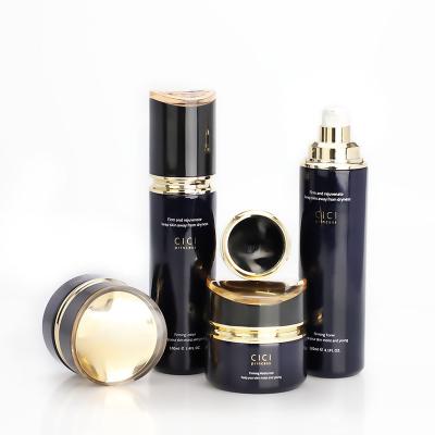 China Cylinder Bottle Set New Design Luxury Skin Care Sets 2023 Black Cosmetic Lotion Bottles Glass Jar Jar for sale