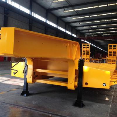 China Tri Axle Low Bed Truck Trailer 60 Ton Flat Bed Lowboy Trailer Semi Trailer With Hydraulic Trailer Ramps for sale