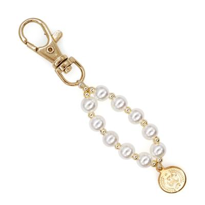 China Alloy New Arrive Gold Metal Keychain With Pearl Beaded Chain Custom Gold Key Logo Tag Keychain Accessories for sale