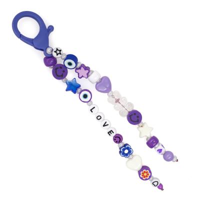 China Alloy Fashion Design Purple Pink Heart Star Beaded Keychain Cute Gummy Bear Charm Custom Love Keychain for sale