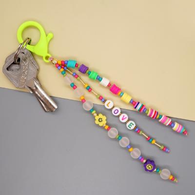 China Creative Alloy Design Colorful Acrylic Beaded Love Key Logo Keychain Accessories For Bags Chain Custom Wallets for sale