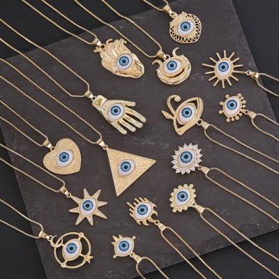 China FASHIONABLE High Quality Blue Eye Heart Eye 18K Gold Bling Zircon Pendent Necklace Eye of Horus Pendent Necklaces for sale