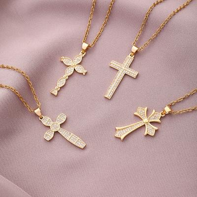 China FASHIONABLE High Quality Gold Finish Jewelry Religious Bling Zircon Paved Stainless Steel Cross Pending Chain Necklace for sale