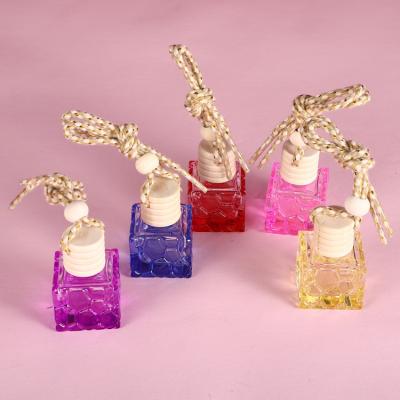 China Personal Care Colorful Square Car Air Freshener Diffuser Clear Perfume Bottle Glass Hanging Essential Oil Bottle for sale