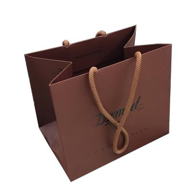 China Recycled Materials Custom Printed Twisted Handle Machine Made Brown Kraft Paper Bag Te koop