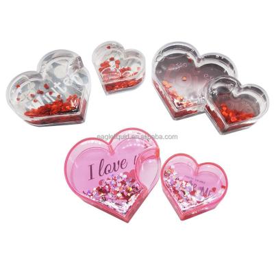 China Wholesale Plastic Shape Acrylic Picture Heart Shape DIY Wedding Love Wedding Snowball Photo Snow Globe for sale