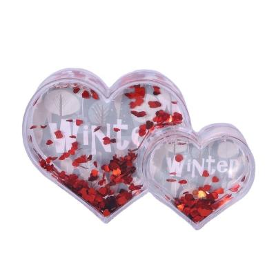 China Plastic Valentine's Day Gifts Love Picture Photo Frame Double Glitter Heart Shape Acrylic Snow Globe With Photo Insert for sale