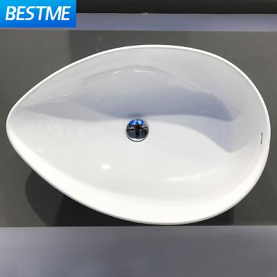 China Modern Special Egg Shape Ceramic Bathroom Sink Designs Hand Sink for sale