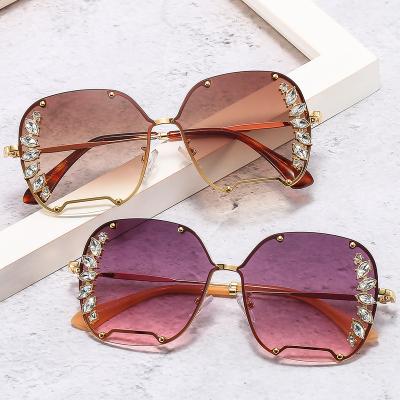 China Oversized Round Shape Bling Diamond Rhinestones Women Shades Sunglasses Fashion 2022 Superhot Rimless Eyewear New for sale