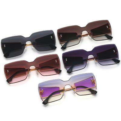 China Fashion Sunglasses Metal PC Frame Men And Women Stylish Luxury Sunglasses 2022 Color Rimless Sun Glasses for sale