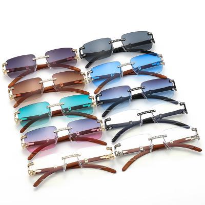 China Fashion Oversized Sunglasses 2022 New Mirror Personality Men Women Rimless Flat Sunglasses Diamond Sunglasses for sale