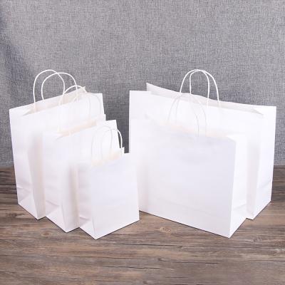 China Manufacturer Recyclable Wholesale Custom Personalized Printed Logo White Kraft Shopping Gift Paper Bag Carrier Bags for sale