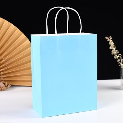 China Good Quality Recyclable Kraft Paper Environmental Friendly Paper Bag Printing Reusable Shopping Clothes Packaging Gift Bags Custom Logo for sale