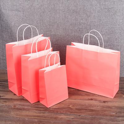 China Recyclable Wholesale Custom Printed Your Own Logo Pink White Kraft Gift craft shopping paper bag packaging with handles for sale