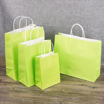 China Recyclable Logo Printed Luxury Green Kraft Wholesale Custom Craft Shopping Gift Bags Paper With Handle for sale