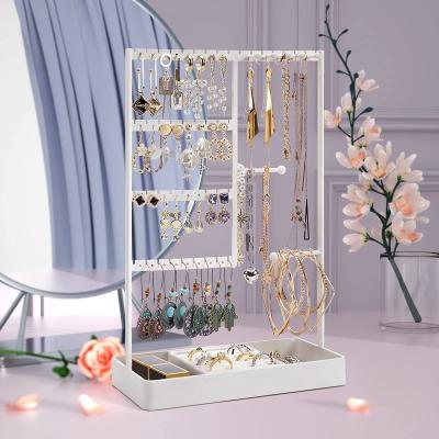 China Sustainable White 4-tier Jewelry Earring Rack Organizer With Metal Tray Necklaces Stud Bracelets Rings Holder Stand for sale